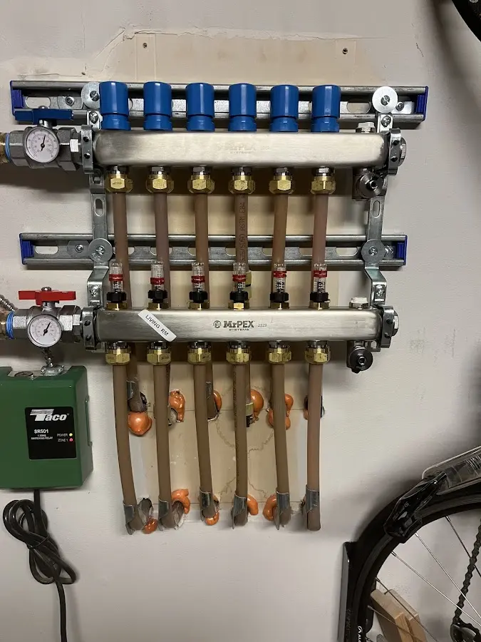 Plumber performing Leak Detection at a residential property in Plainville